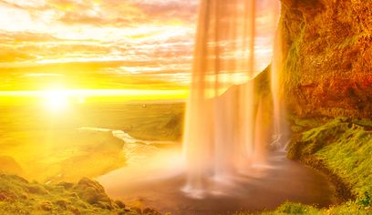 Seljalandsfoss on the South Coast in Iceland. Midnight sun.